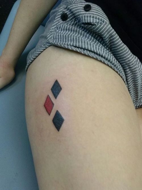 Harley Quinn Symbol Tattoo On Right Thigh For Girls
