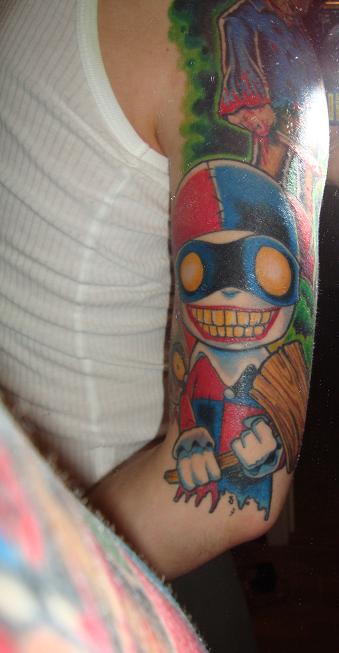 Harley Quinn Tattoo On Left Half Sleeve by Aircap