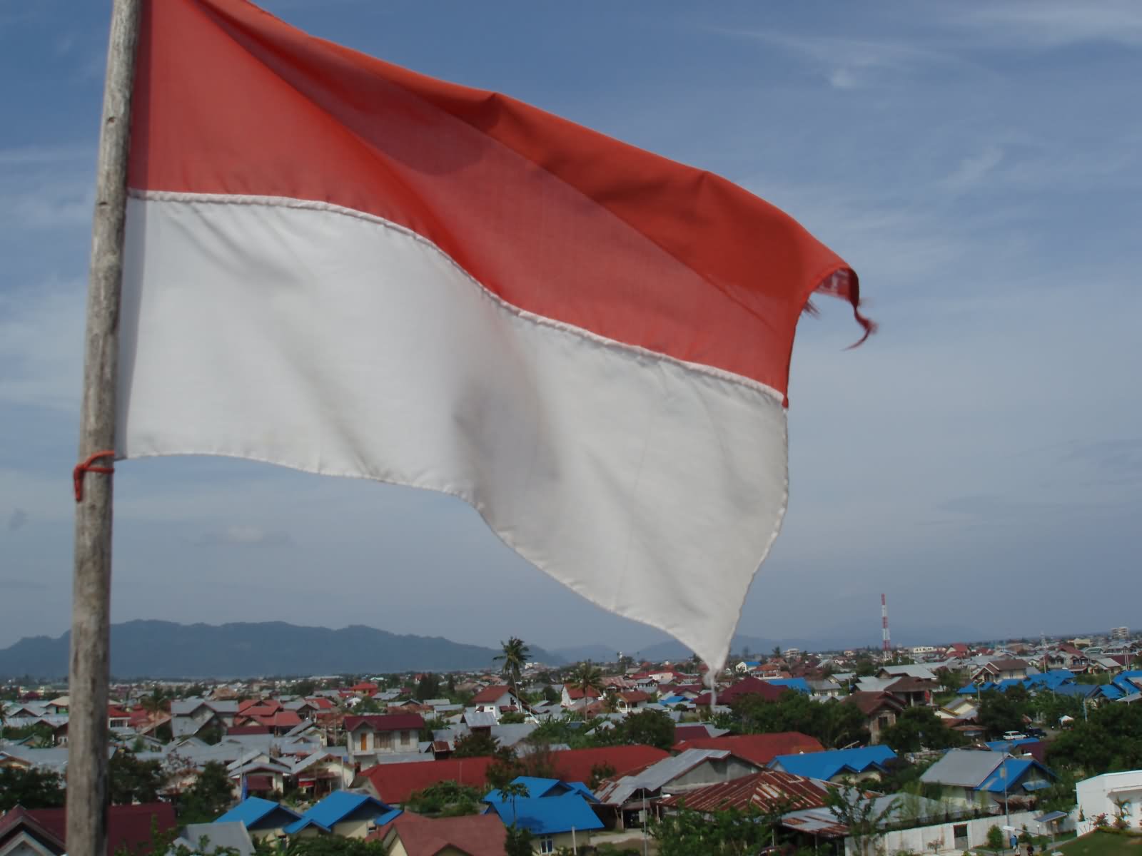 Indonesian Flag Waving On The Eve Of Indonesian Independence Day