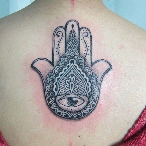 Inspiring Hamsa Tattoo On Girl Upper Back