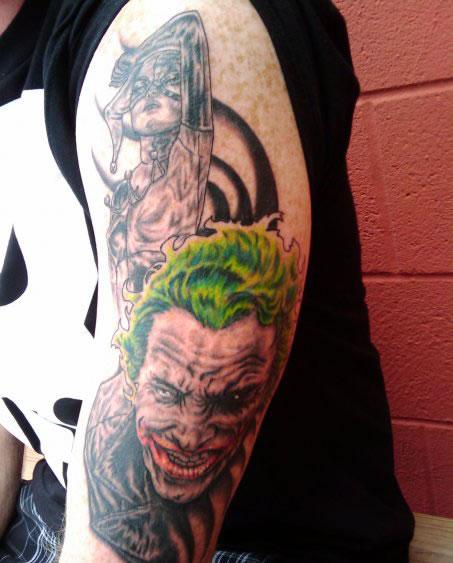 Joker And Harley Quinn Tattoo On Man Left Arm Sleeve