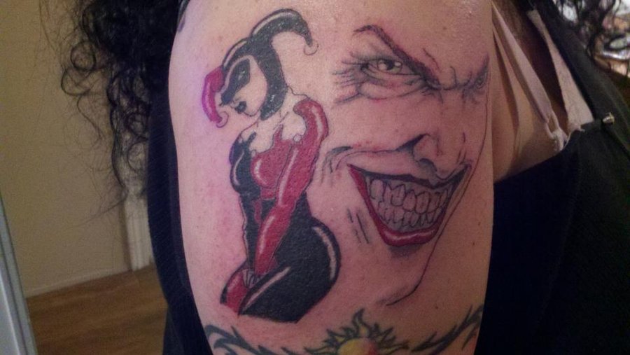 Joker Head And Harley Quinn Tattoo On Right Shoulder