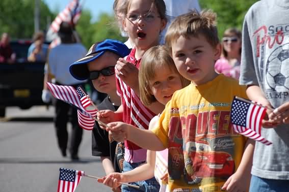 Kids Taking Part In Memorial Day Parade