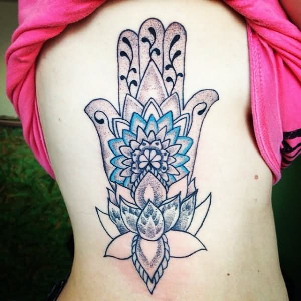 Latest Hamsa With Lotus Flower Tattoo On Girl Side Rib