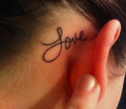 Love Word Tattoo On Right Behind The Ear
