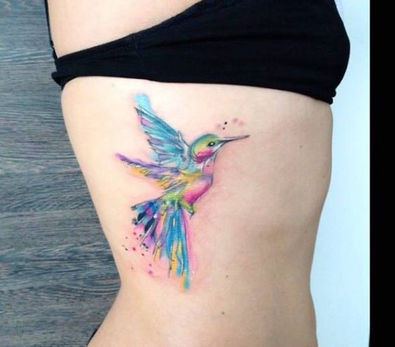 Lovely  Watercolor Colibri Tattoo On Girl Side Rib