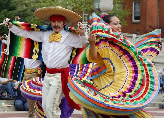 Mexican Couple Dancing And Celebrating Cinco de Mayo