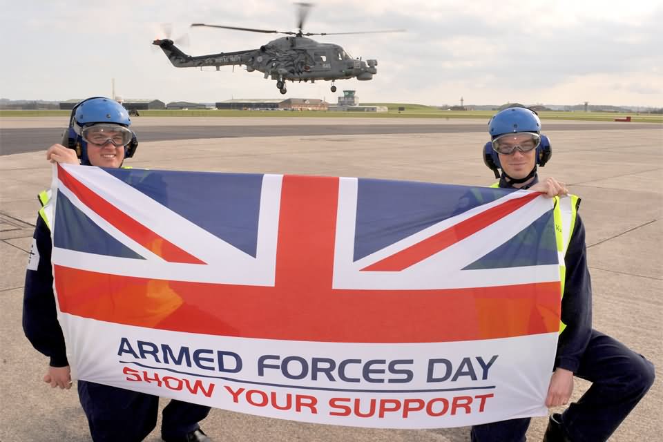 Military Personnel With Armed Forces Day Flag Picture