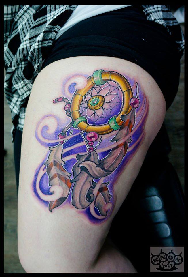Nice Colored Dreamcatcher Tattoo On Left Thigh by Marco Knox