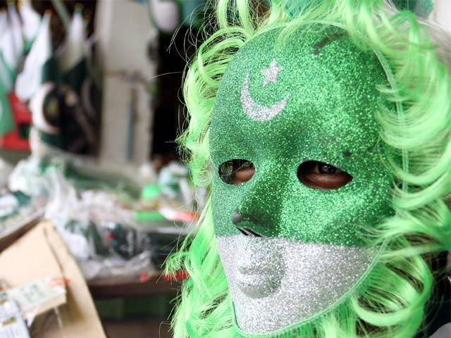 Pakistan Flag Mask On The Eve Of Independence Day Of Pakistan