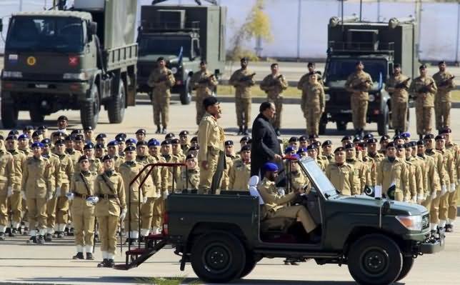 Pakistan President Inspects Troops During The Independence Day Parade