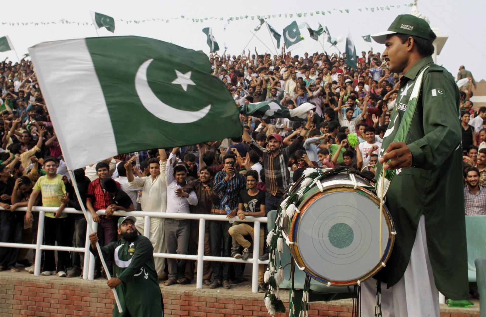 Pakistanis Take Part In Ceremony Celebrating The Independence Day Of Pakistan At Wagah
