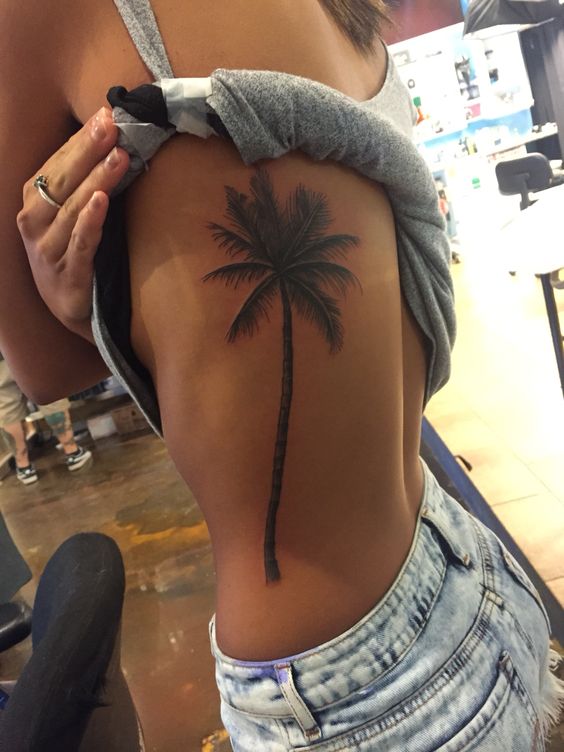 Palm Tree Tattoo On Girl Rib Side