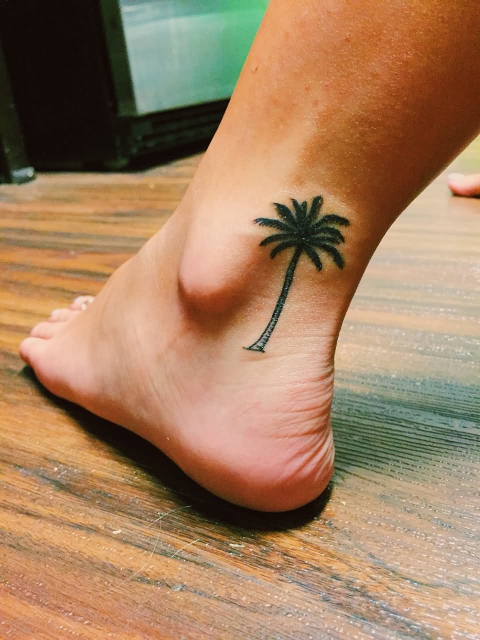 Palm Tree Tattoo On Left Leg