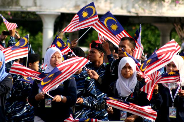 People Of Malaysia Taking Part In Malaysia Independence Day Parade