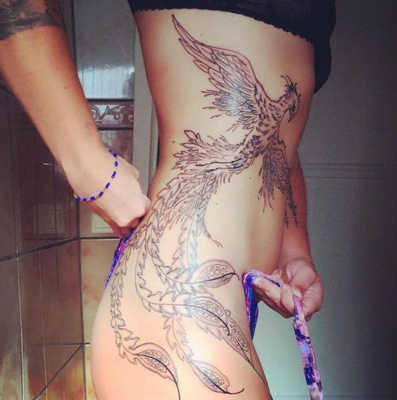 Phoenix Tattoo On Girl Side Rib
