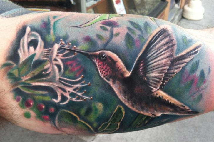 Realistic Colibri Tattoo On Muscles