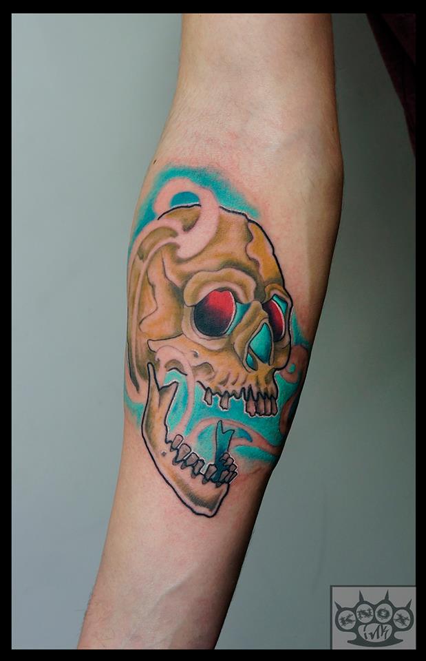 Red Eyes Skull Tattoo On Forearm by Marco Knox