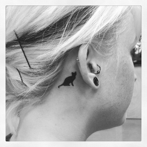 Silhouette Cat Tattoo On Girl Right Behind The Ear