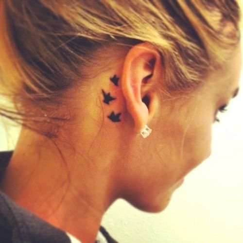 Silhouette Flying Birds Tattoo On Girl Behind The Ear By Cari Buen