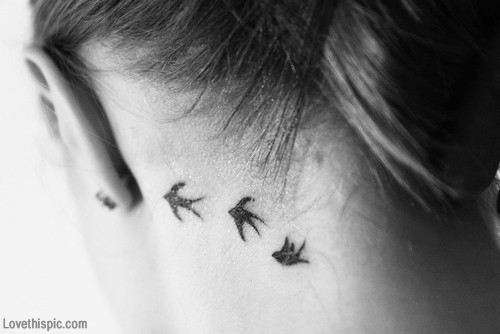 Silhouette Flying Birds Tattoo On Girl Left Behind The Ear