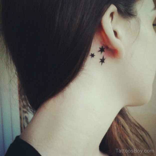 Silhouette Stars Tattoo On Girl Right Behind The Ear