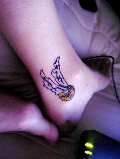 Simple Snitch Tattoo On Ankle