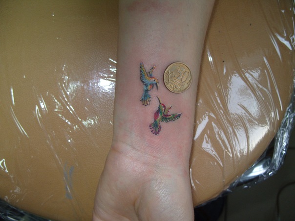 Small Flying Colibri Tattoos On Left Wrist
