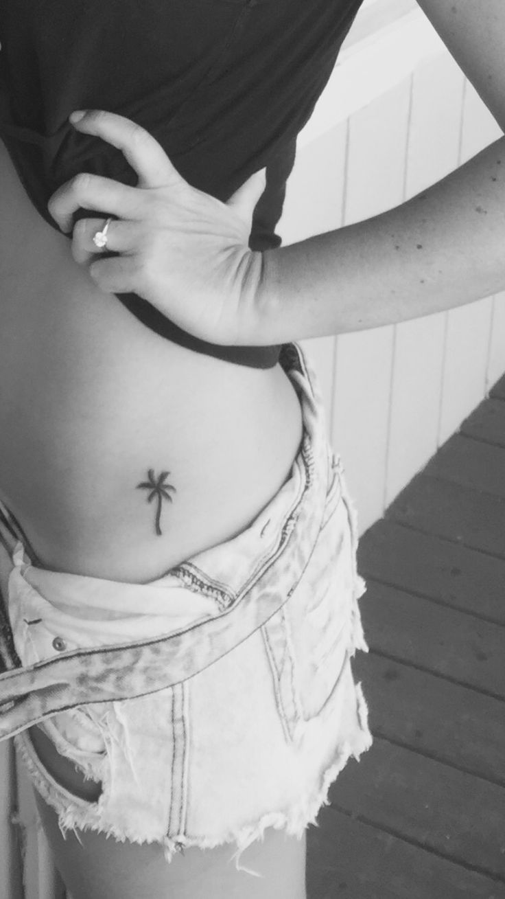 Small Palm Tree Tattoo On Left Side Rib