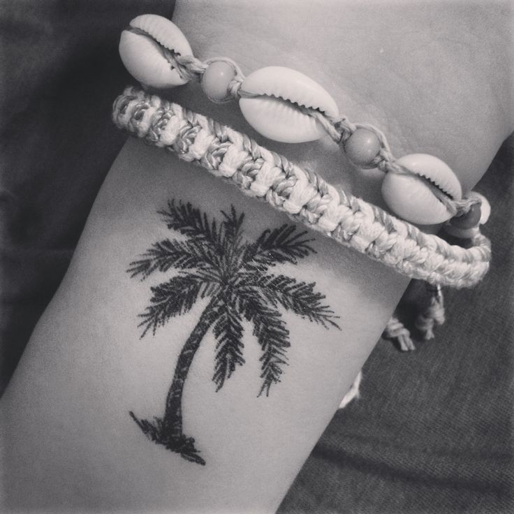 Small Palm Tree Tattoo On Left Wrist