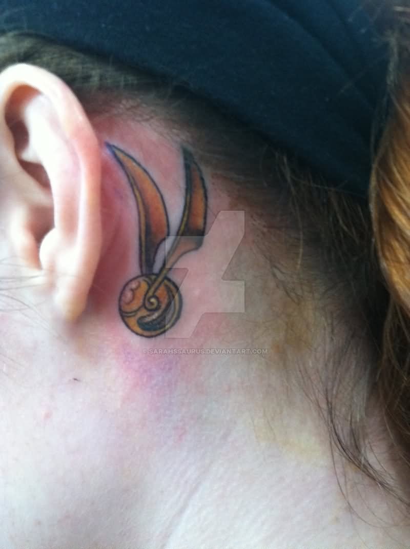 Snitch Tattoo On Left Behind The Ear By Sawah Saurus