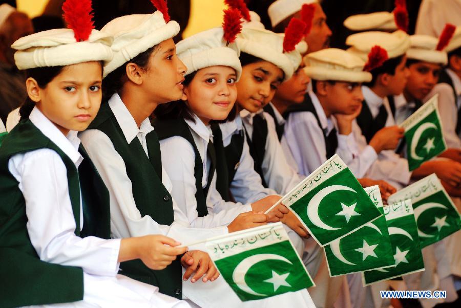 Students With Pakistani Flags Celebrating Independence Day Of Pakistan