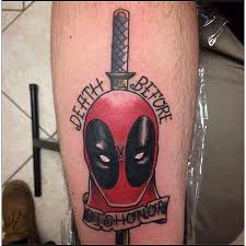 Sword In Deadpool Head With Banner Tattoo Design For Sleeve