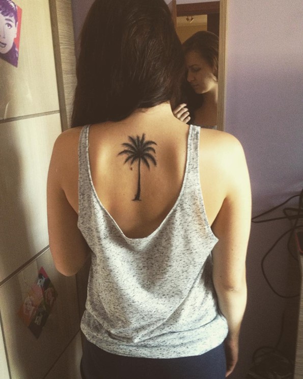 Upper Back Black Palm Tree Tattoo For Girls