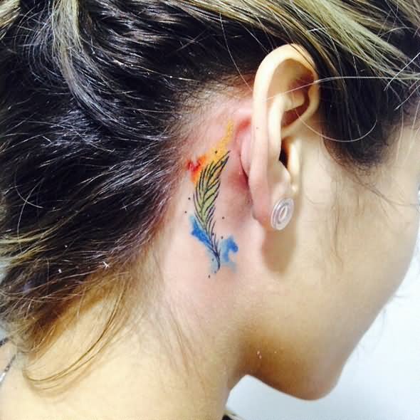 Watercolor Feather Tattoo On Girl Right Behind The Ear