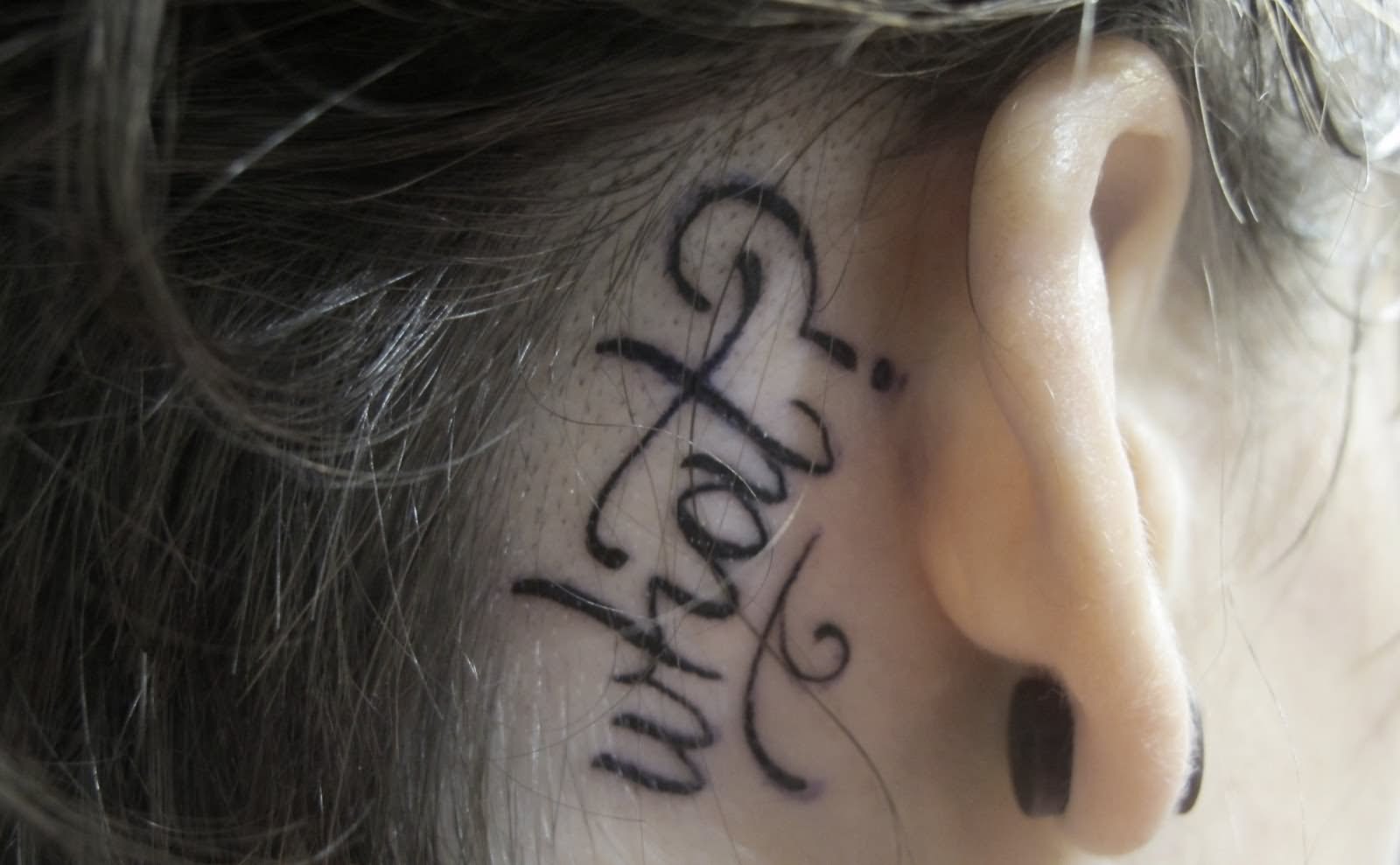 What Word Tattoo On Girl Right Behind The Ear