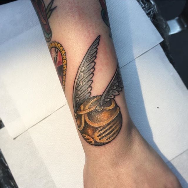 snitch Tattoo On Upper Wrist By Michelle Tattooer