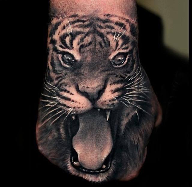 Angry Tiger Face Tattoo On Right Hand