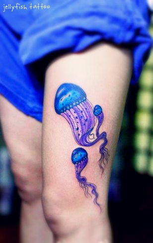 Awesome Colored Jellyfish Tattoo On Left Thigh