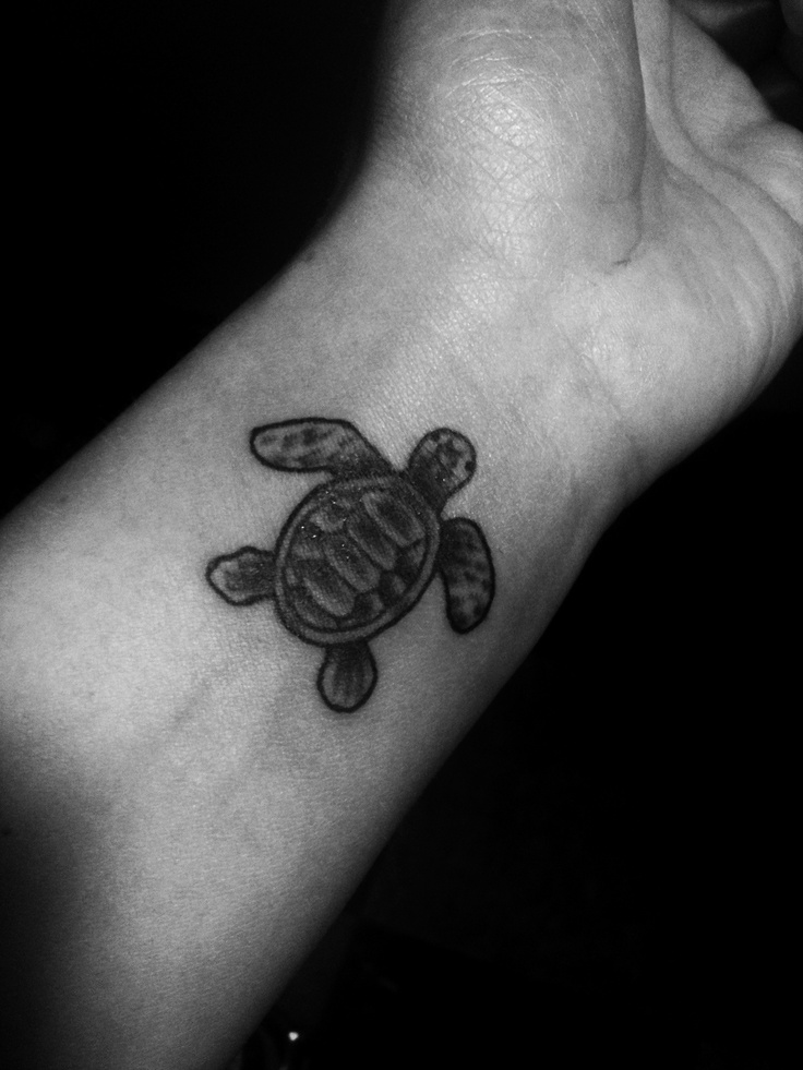 Black And Grey Turtle Tattoo On Man Left Wrist