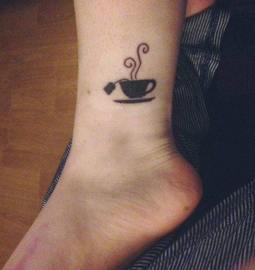 Black Teacup Tattoo On Leg