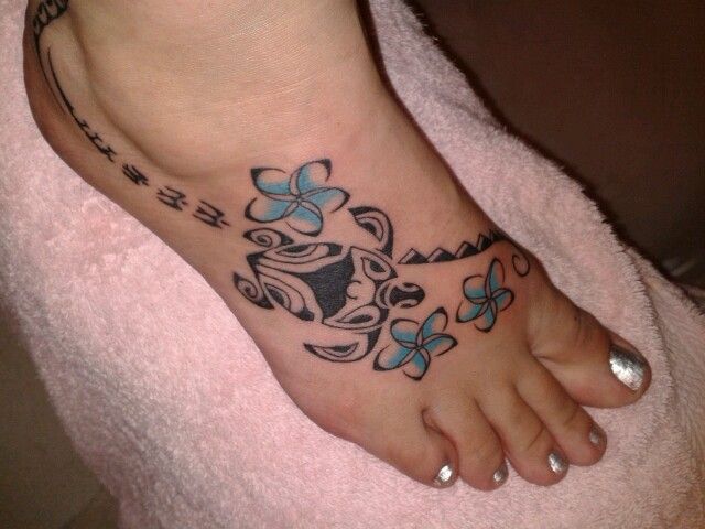 Blue Flowers And Tribal Turtle Tattoo On Right Foot