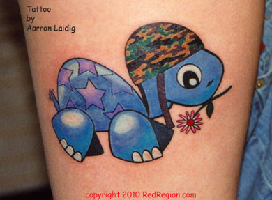 Blue Ink Baby Turtle With Flower Tattoo On Bicep