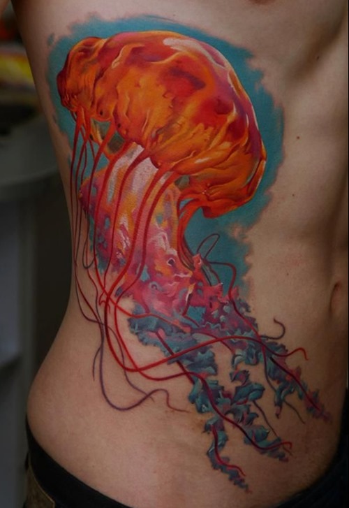 Colored Jellyfish Tattoo On Side Rib