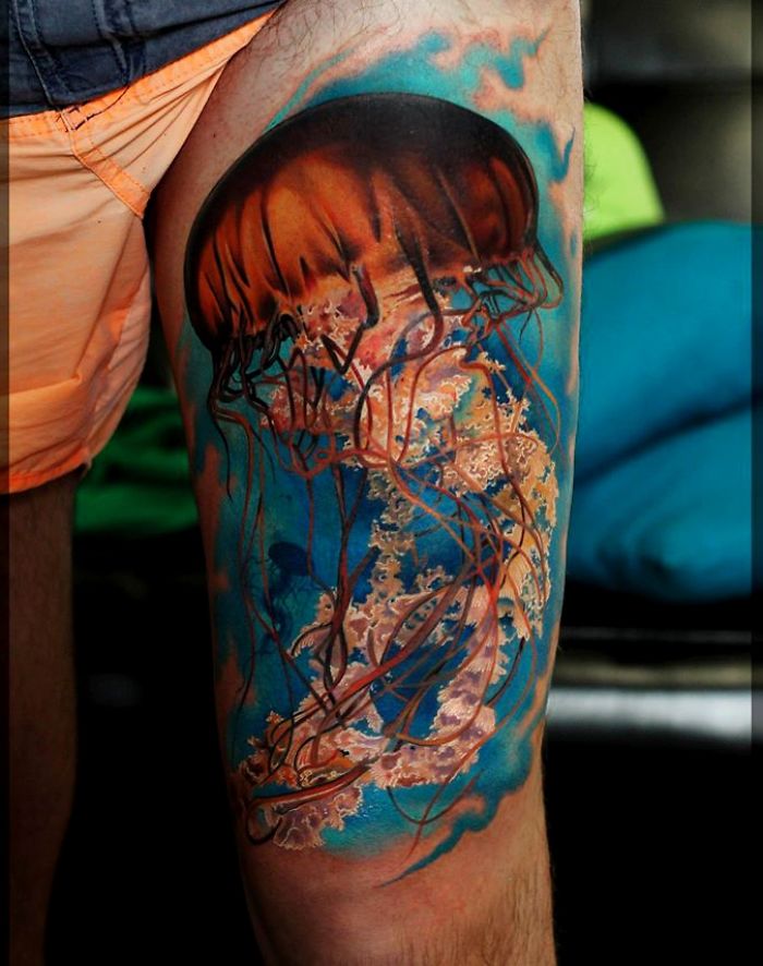 Colored Jellyfish Tattoo On Thigh