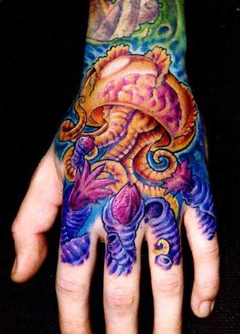 Colorful Jellyfish Tattoo On Left Hand