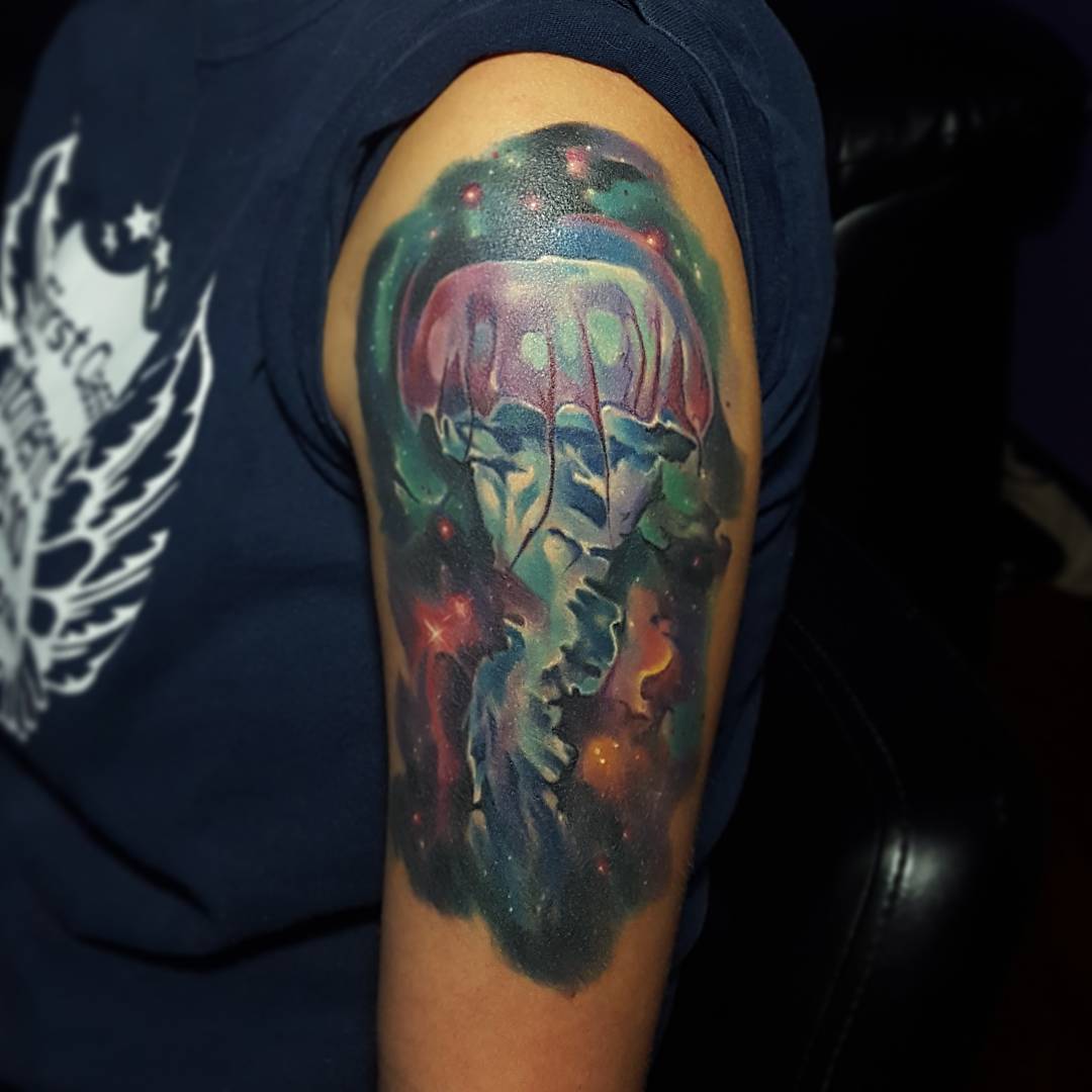 Colorful Jellyfish Tattoo On Left Shoulder