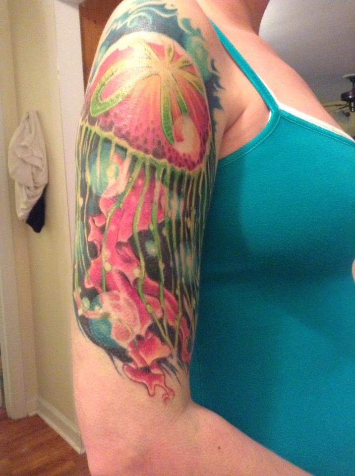 Girl With Jellyfish Tattoo On Right Half Sleeve