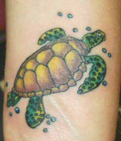 Green Ink Turtle Tattoo On Bicep