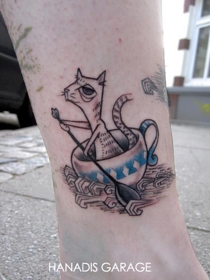Grey Ink Cat In Teacup Tattoo by Hanadis